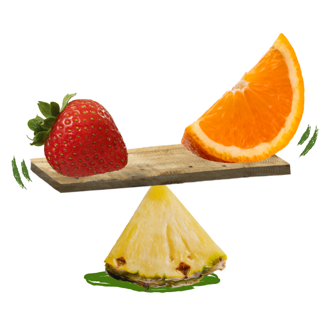 Erdbeere und Orange auf einer Ananasskala ausbalanciert
